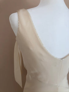 Christiana Couture 'Saskia' size 2 used wedding dress back view on mannequin