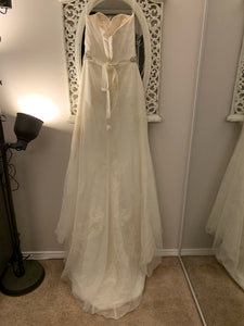 Modern Trousseau 'Ryan' size 10 used wedding dress back view on hanger