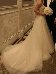 Maggie Sottero 'Lorenza' size 4 used wedding dress side view on bride