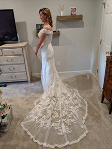 Oleg Cassini 'CWG807' size 6 new wedding dress side view on bride