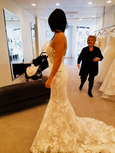 Mira Zwillinger 'Sammy' size 4 used wedding dress side view on bride