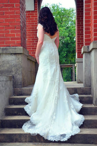 Lillian West 'Tulle Fit And Flare' size 8 used wedding dress back view on bride