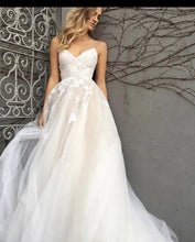 Load image into Gallery viewer, Monique Lhuillier &#39;Astor&#39; size 10 sample wedding dress front view on model
