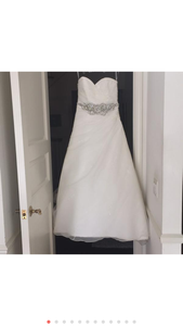 Pronovias 'Sweetheart Sparkle Princess' size 6 used wedding dress front view on hanger