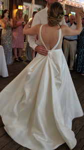 BHLDN 'Octavia' size 4 used wedding dress back view on bride