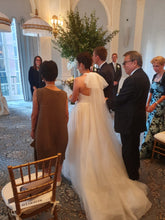 Load image into Gallery viewer, Vera Wang White &#39;Bow-Back Halter&#39; size 10 used wedding dress back view on bride
