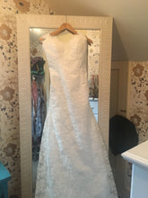 Load image into Gallery viewer, Custom &#39;Keyhole Back Lace&#39; size 4 new wedding dress front view on hanger
