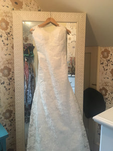 Custom 'Keyhole Back Lace' size 4 new wedding dress front view on hanger