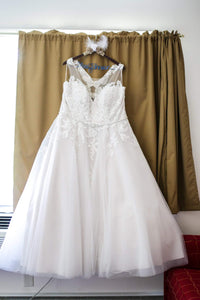 Rebecca Ingram 'Olivia' size 24 used wedding dress front view on hanger