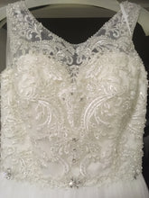 Load image into Gallery viewer, Allure Bridals &#39;Beaded Illusion&#39; size 8 used wedding dress front view close up on hanger
