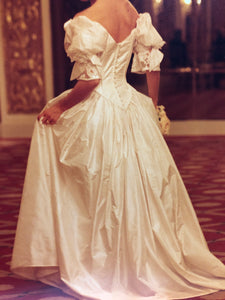 Custom 'Romantic' size 4 used wedding dress back view on bride