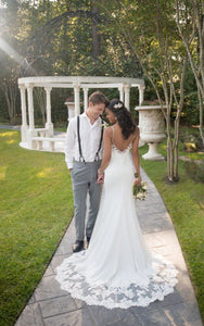 Stella York 'Sexy Beach' size 10 used wedding dress back view on bride