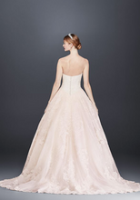 Load image into Gallery viewer, Oleg Cassini &#39;Strapless Petite&#39; size 12 new wedding dress back view on model
