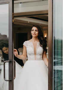 Maria Farabinni 'Valeria' size 4 used wedding dress front view on bride