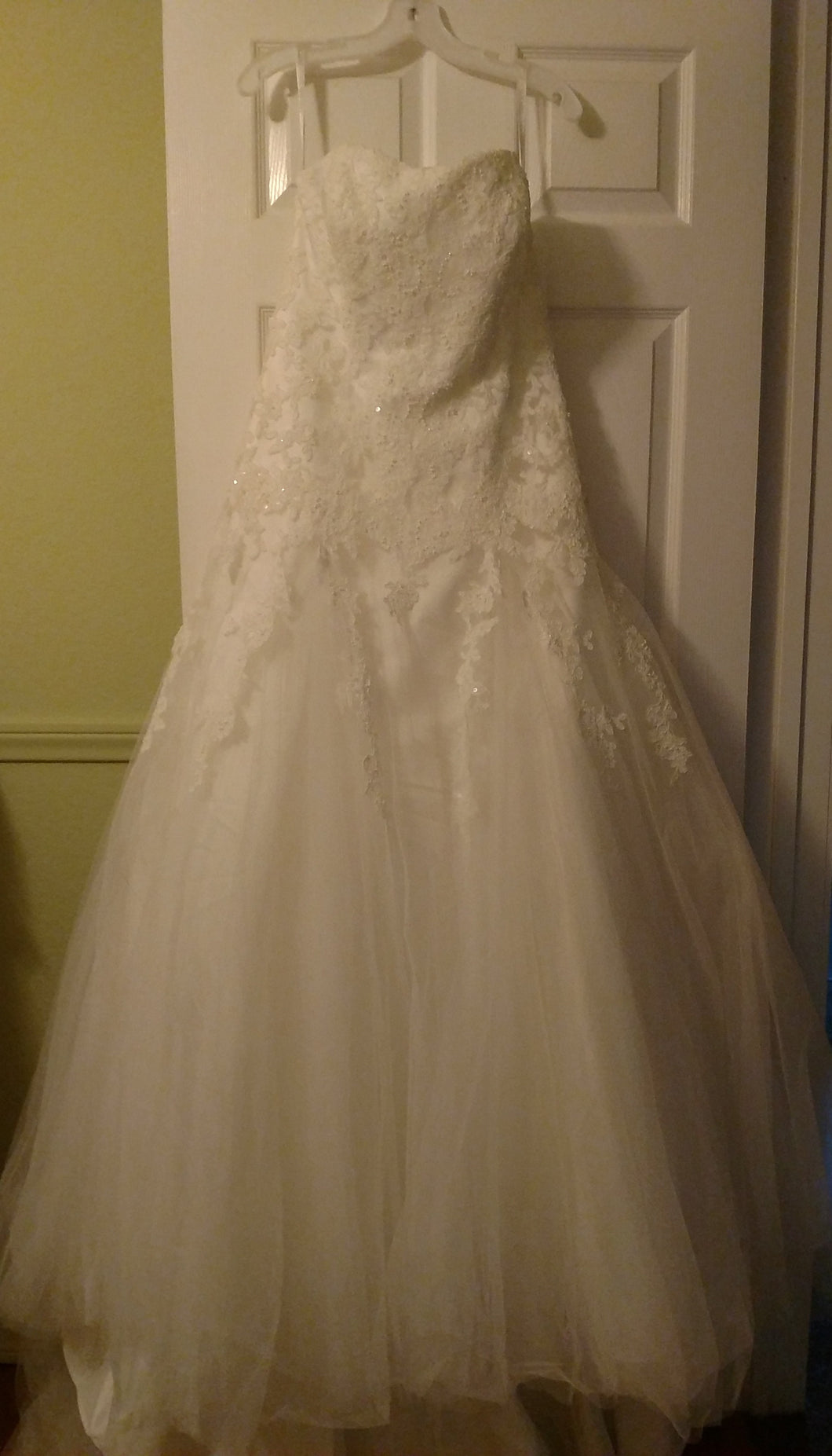 David's Bridal 'Strapless Tulle' size 12 new wedding dress front view on hanger