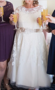 Oleg Cassini 'Cap Sleeve Illusion' size 16 used wedding dress front view on bride