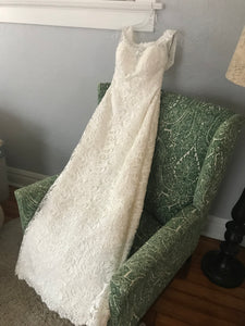 Custom 'DK' size 10 new wedding dress side view on hanger