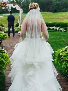 Watters 'Meri Beaded' size 6 used wedding dress back view on bride