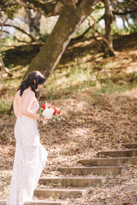 Watters 'Sanya' size 6 used wedding dress side view on bride