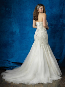 Allure Bridals 'Unforgettably Chic' size 24 used wedding dress back view on model