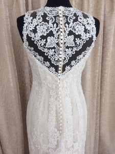 Pronovias 'Aura' size 6 sample wedding dress back view on mannequin