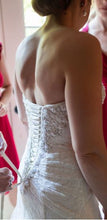Load image into Gallery viewer, David&#39;s Bridal &#39;A Line&#39; size 2 used wedding dress back view close up on bride
