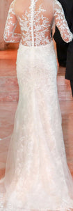 Reem Acra 'I'm Extravagent' size 6 used wedding dress back view on bride