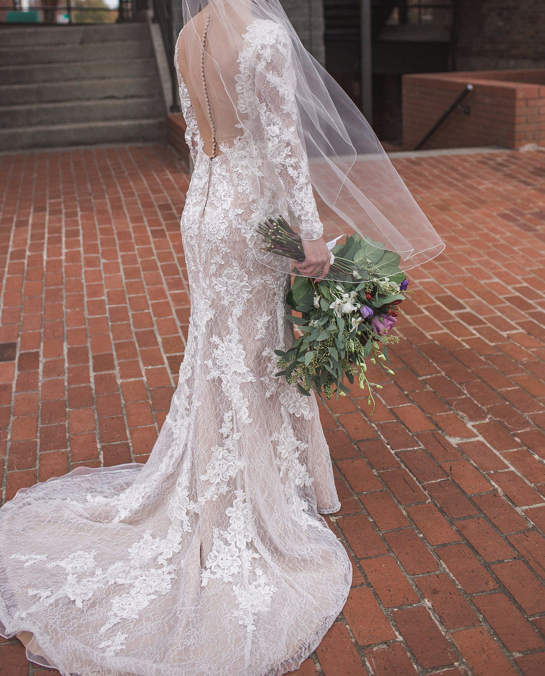 Galina 'Signature' size 2 used wedding dress back view on bride