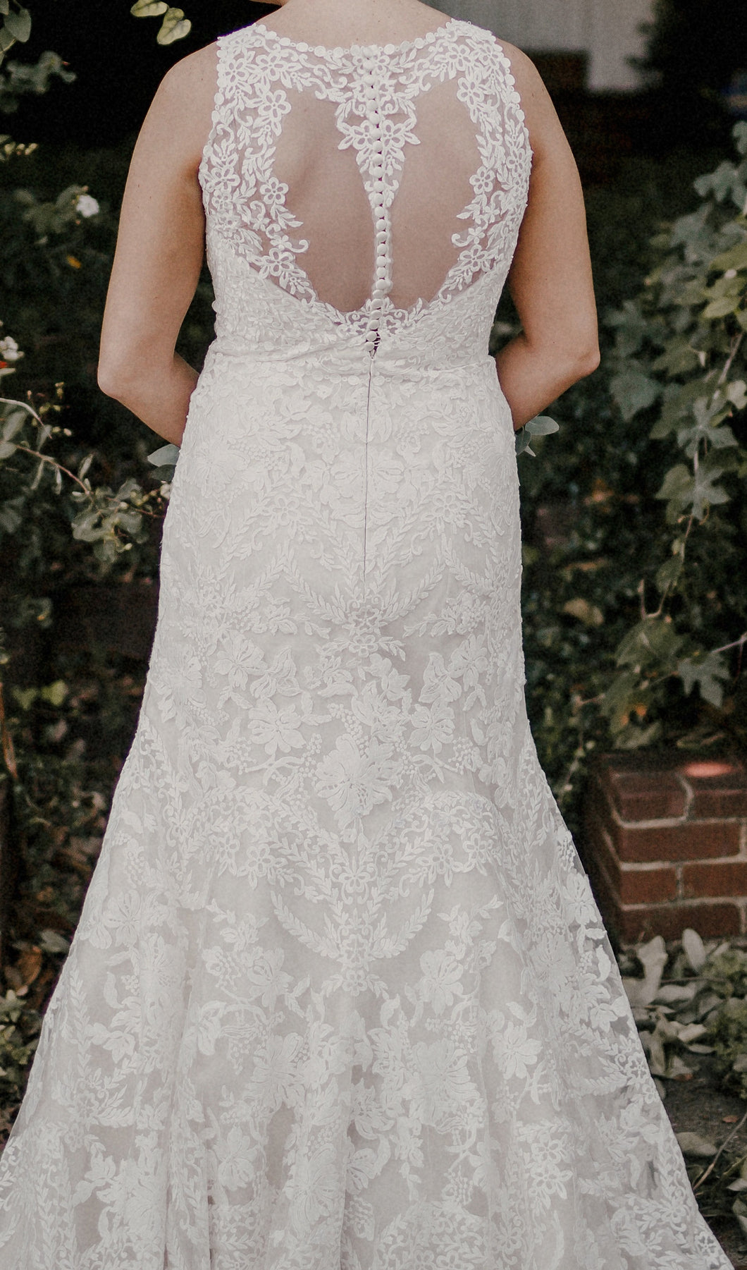 Eddy K '1021' size 12 used wedding dress back view on bride