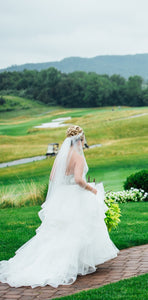 Watters 'Meri Beaded' size 6 used wedding dress side view on bride