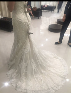 Leggenda Bridal 'Strapless' size 4 new wedding dress back view on bride