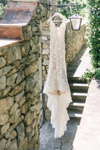 Pronovias 'Estela' size 2 used wedding dress front view on hanger