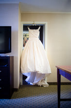 Load image into Gallery viewer, Vera Wang &#39;Off the Shoulder&#39; size 6 used wedding dress front view on hanger
