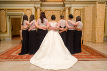 Load image into Gallery viewer, Vera Wang &#39;Off the Shoulder&#39; size 6 used wedding dress back view on bride
