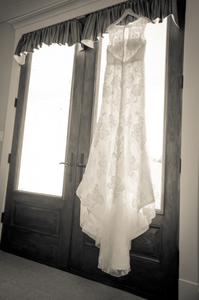 Oleg Cassini 'Tank Illusion Back' size 6 used wedding dress back view on hanger