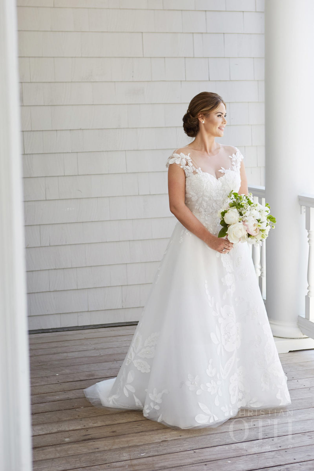 Oscar de la Renta 'Dena' size 10 used wedding dress front view on bride