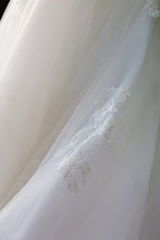 Load image into Gallery viewer, Maggie Sottero &#39;Marianne&#39; size 6 used wedding dress view of rip
