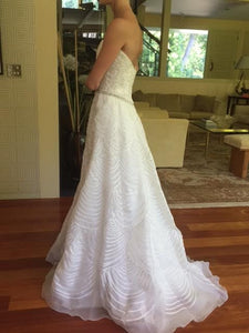 Rivini 'Applique' size 4 new wedding dress side view on bride