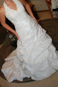 David's Bridal '9606' size 12 used wedding dress front view on bride