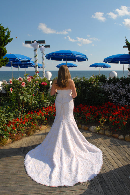 Impression Bridal 'Zurc' size 10 used wedding dress back view on bride