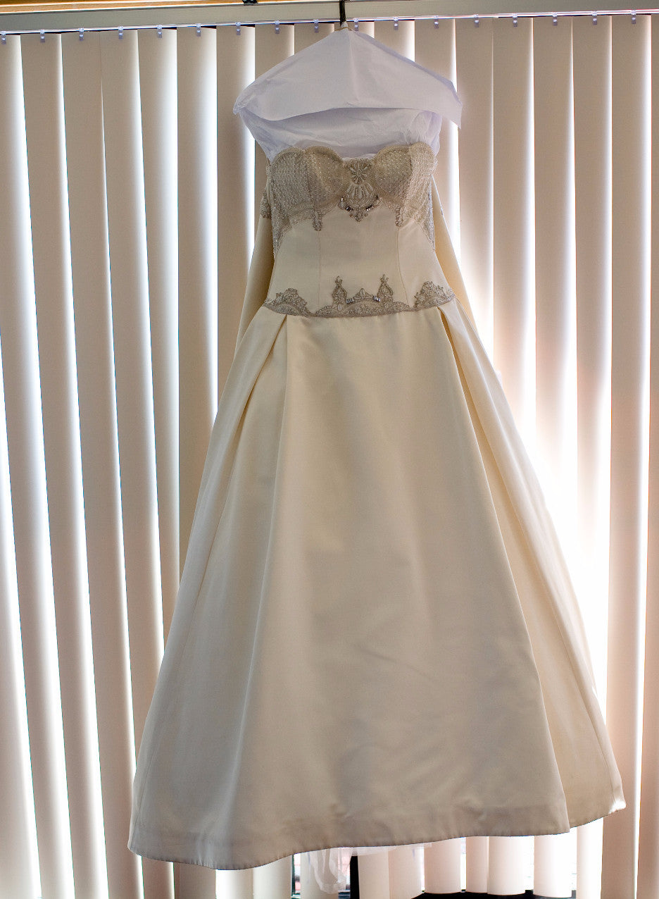 Kenneth Pool 'Custom Beaded' size 10 used wedding dress front view on hanger