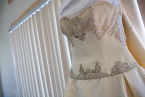 Kenneth Pool 'Custom Beaded' size 10 used wedding dress front view close up of bust line