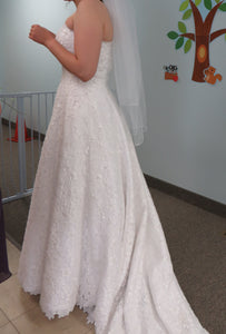 David's Bridal 'Michaelangelo' size 12 used wedding dress side view on bride