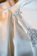 Load image into Gallery viewer, Rivini &#39;Beaded Strapless&#39; size 8 used wedding dress view of trim
