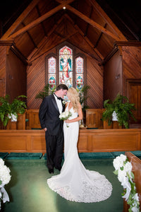 Watters 'Cruz' size 4 used wedding dress side view on bride