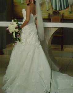 Maggie Sottero 'Rihanna Royale' size 8 used wedding dress back view on bride