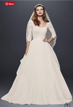 Load image into Gallery viewer, Oleg Cassini &#39;Organza 3/4 Sleeve&#39; size 6 new wedding dress front view close up on model
