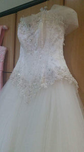 Custom 'Cinderella' size 8 used wedding dress front view on hanger