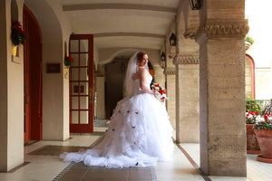 Oleg Cassini 'Strapless' size 16 used wedding dress side view on bride