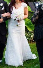 Load image into Gallery viewer, Danielle Caprese &#39;113007&#39; size 6 used wedding dress front view on bride
